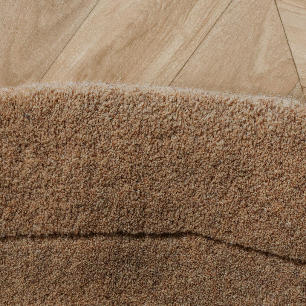 Organic rug - Isara Border Brown